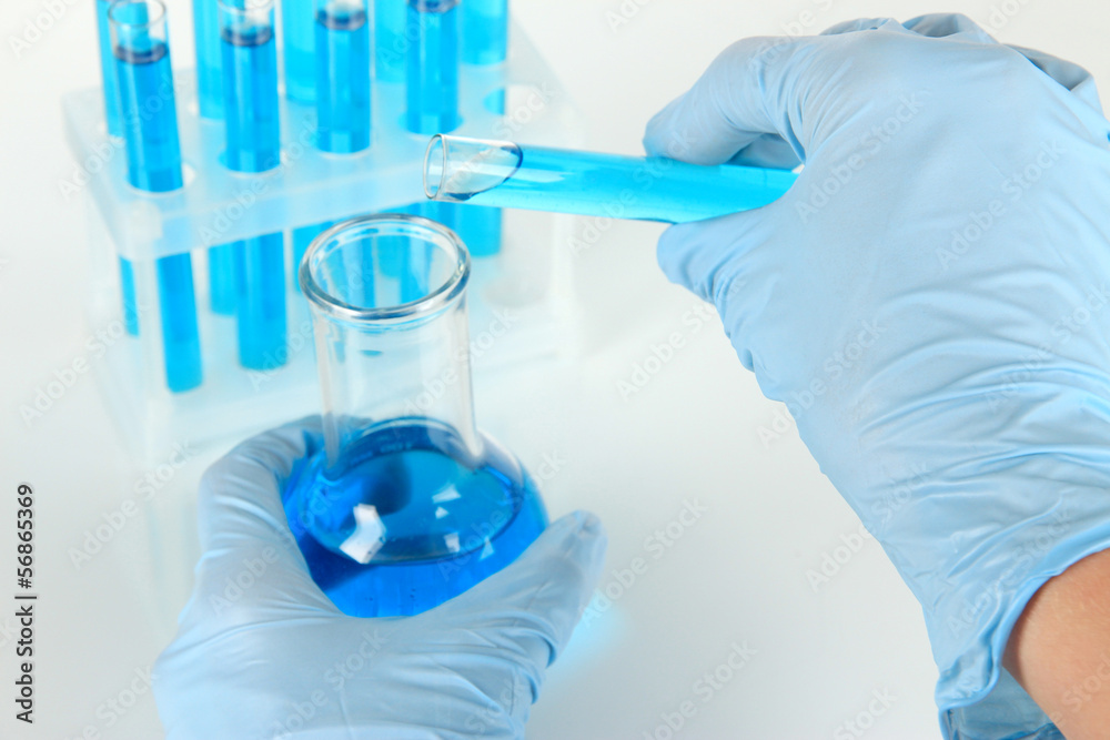 Scientist working at laboratory isolated on white Scientist working at laboratory isolated on white