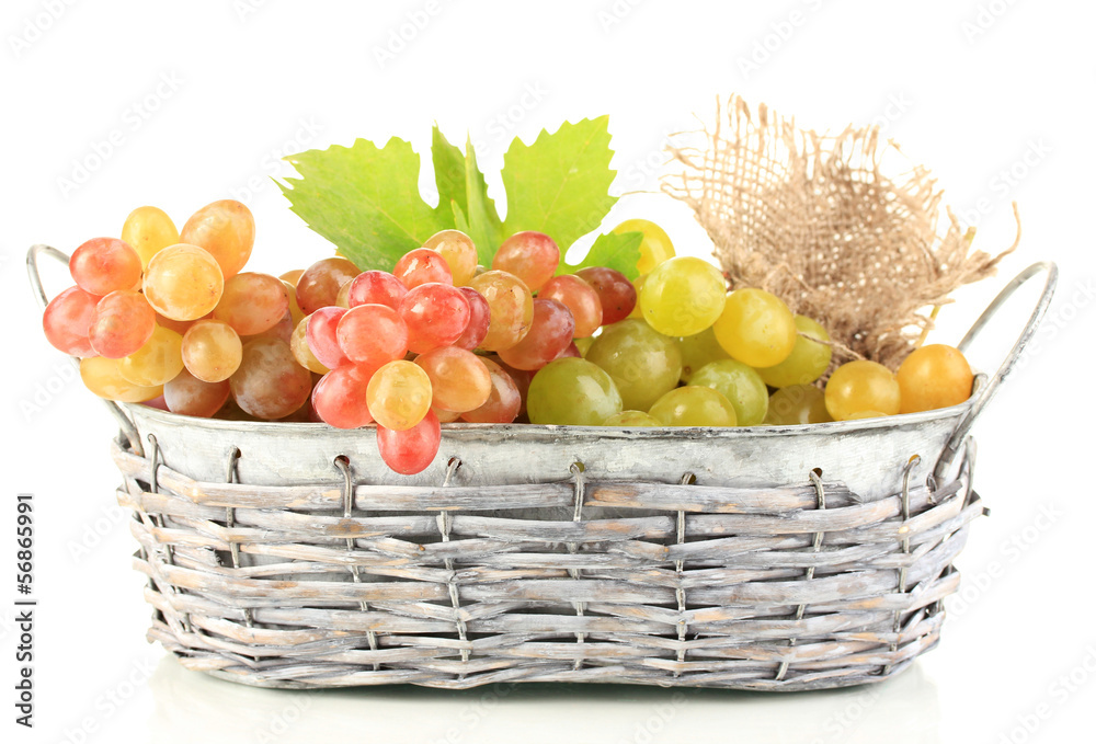 Ripe sweet grape in basket, isolated on white