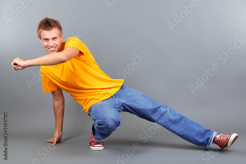 Handsome young man dancing ...