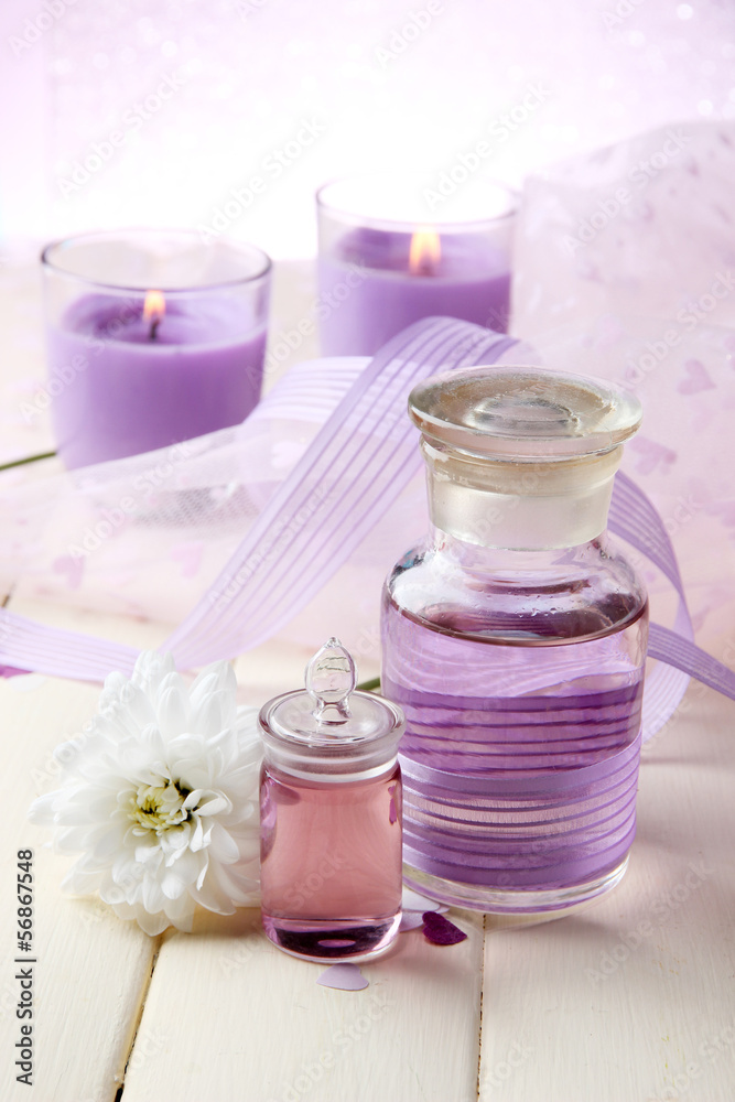 Glass bottles with color essence, on light background Glass bottles with color essence, on light background