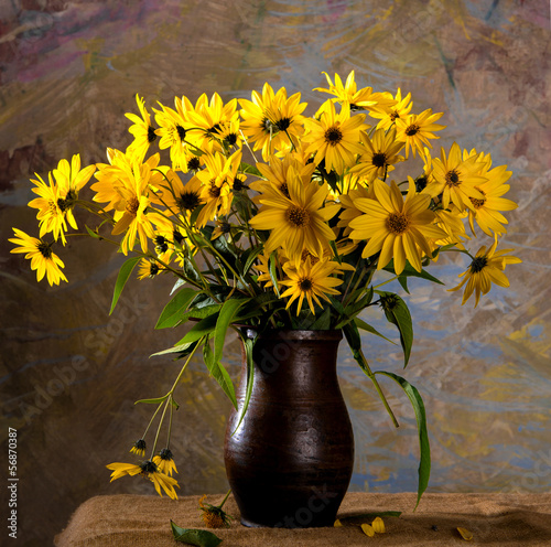 Still life with bunch of bright yellow flowers (rudbeckia)