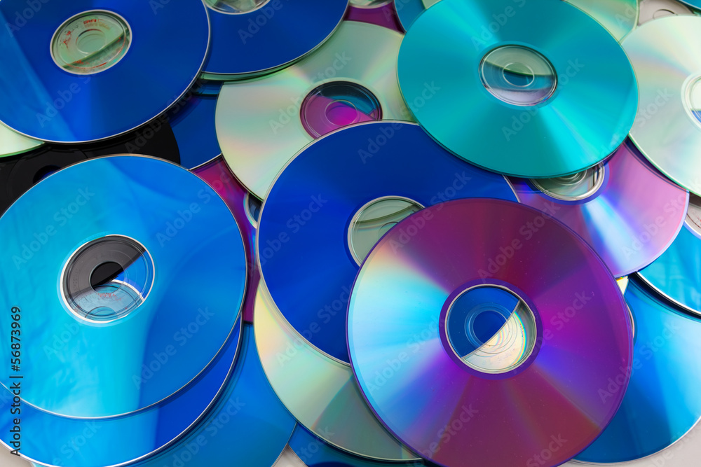 heap of compact disk as a background heap of compact disk as a background