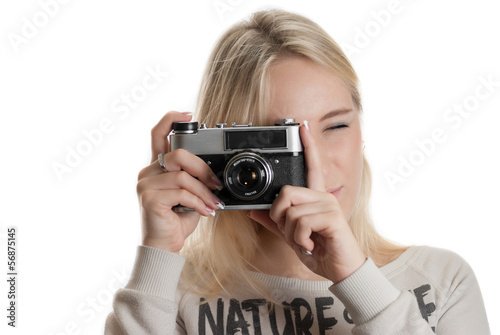 young beautifull girl with vintage camera