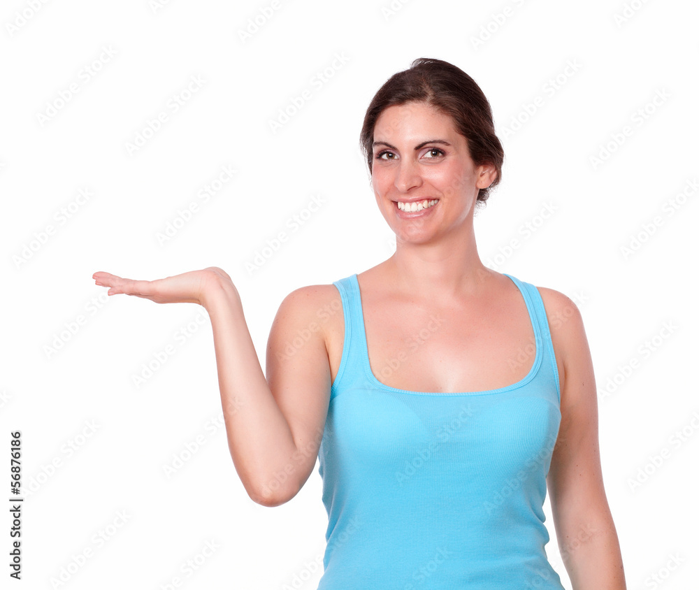 Gorgeous young woman holding palm out Gorgeous young woman holding palm out