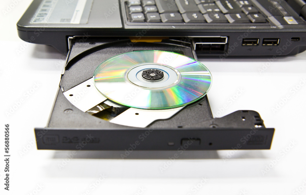 CLoseup CDROM Tray and diskette on Laptop CLoseup CDROM Tray and diskette on Laptop