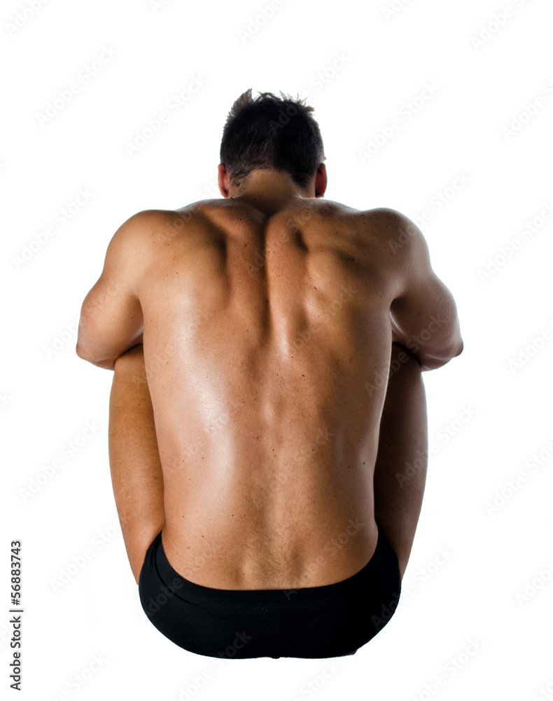 Muscular back of shirtless young man sitting on the floor Stock Photo |  Adobe Stock