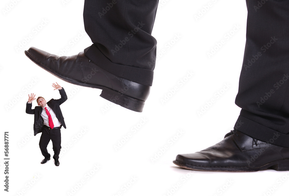 Business man steping on a fear man Business man steping on a fear man