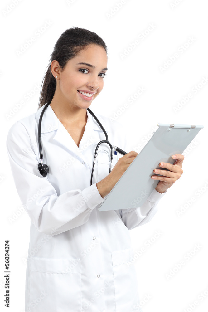 Beautiful arab female doctor writing a medical history isolated Beautiful arab female doctor writing a medical history isolated