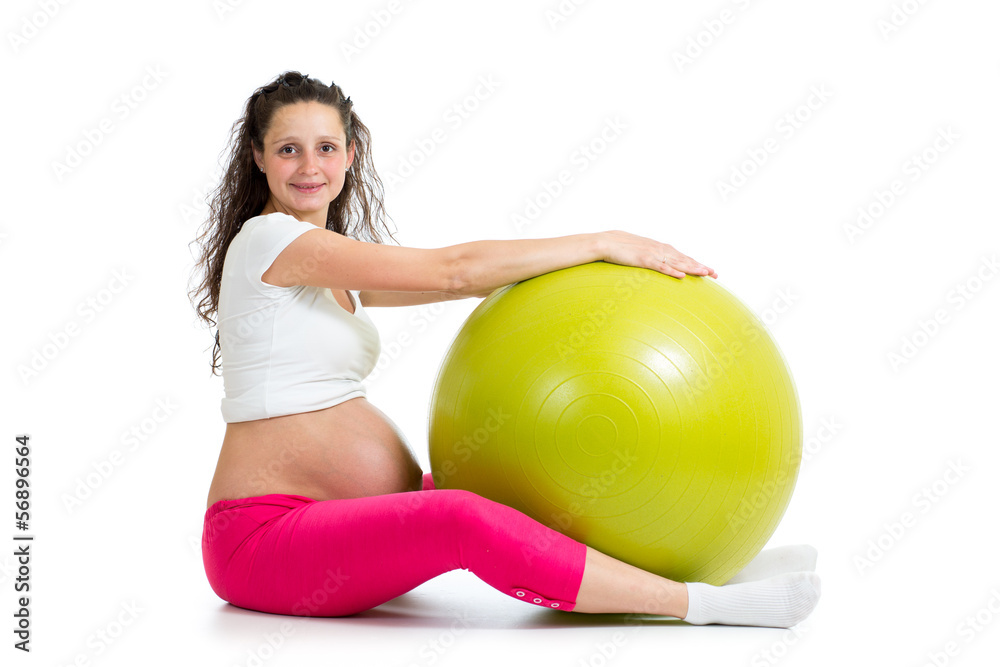 Pregnant woman excercises with fit ball Pregnant woman excercises with fit ball