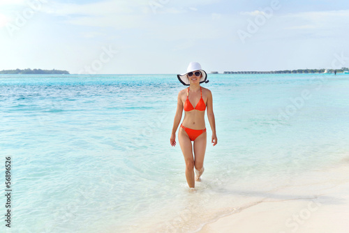 beautiful girl on beach have fun and relax