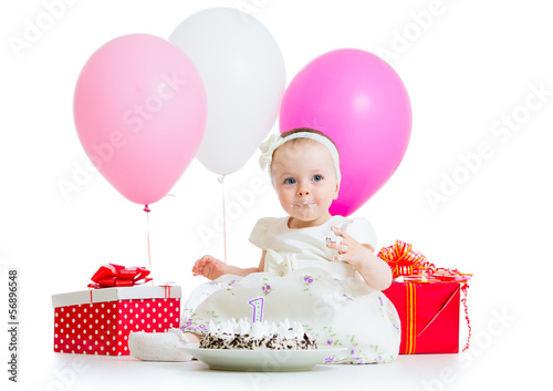 cute kid girl eating birthd...