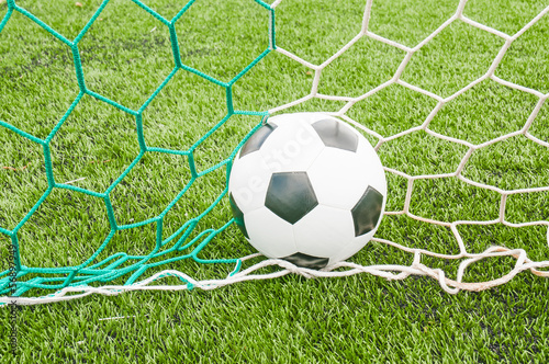 Football in the goal net