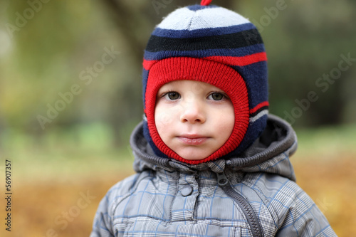 Child at autumn park