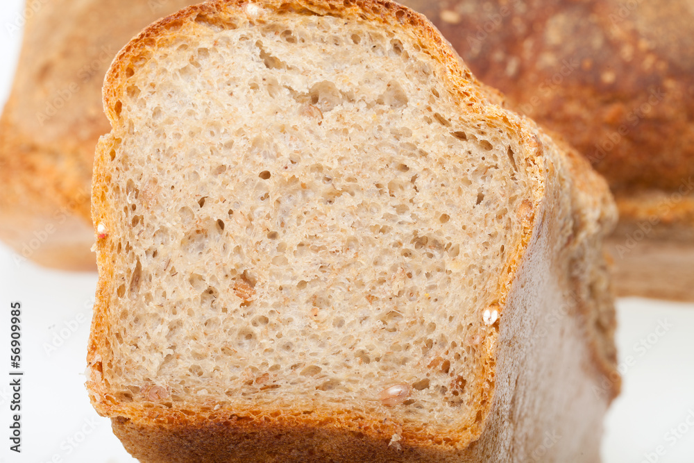 loaves of bread traditionally roasted. Background. Close up. loaves of bread traditionally roasted. Background. Close up.
