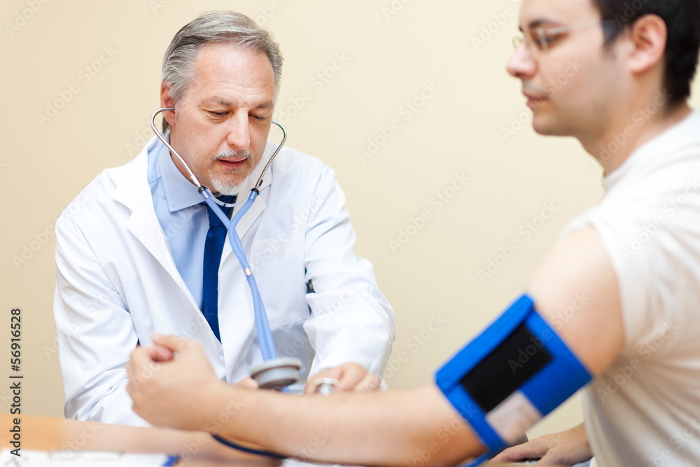 Doctor and patient with blood pressure meter. Health care. Doctor and patient with blood pressure meter. Health care.