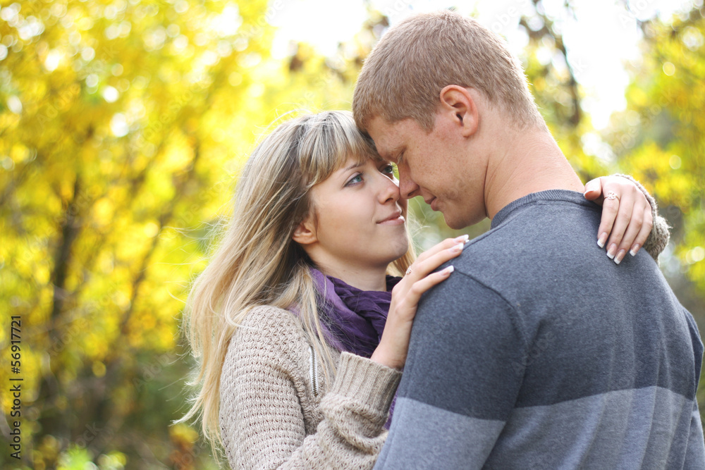 Young couple in love smiling looking at each other Young couple in love smiling looking at each other