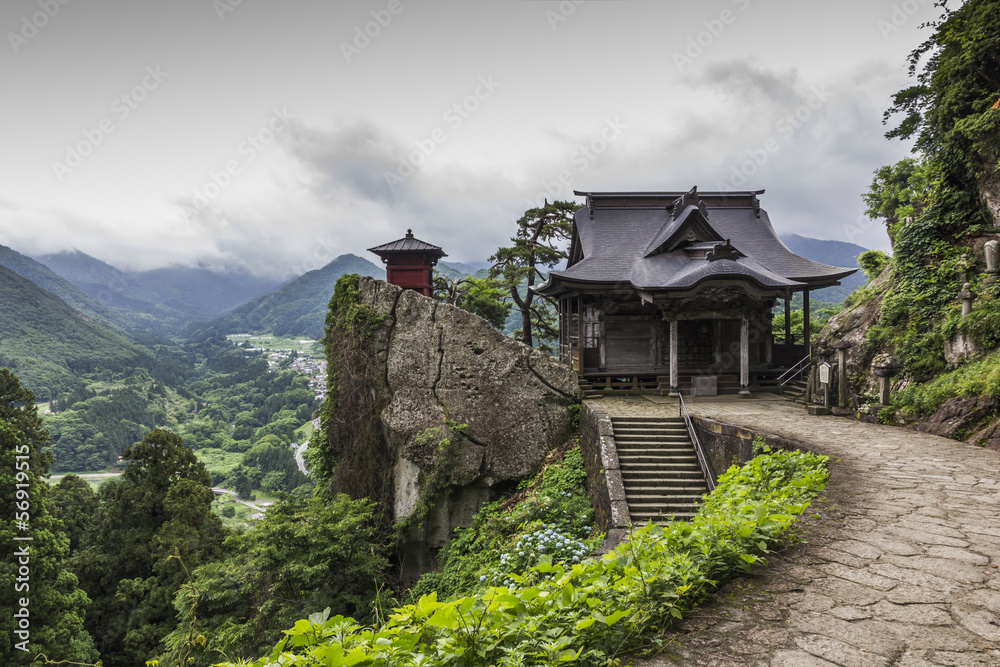 Fototapeta premium view of japanese buddhist temple in Yamadera with beautiful land
