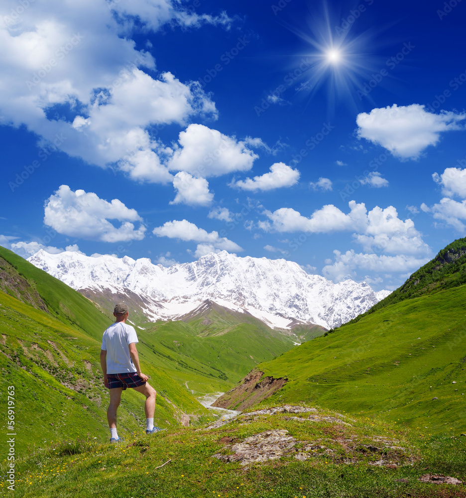 Tourist in the mountains of the Caucasus