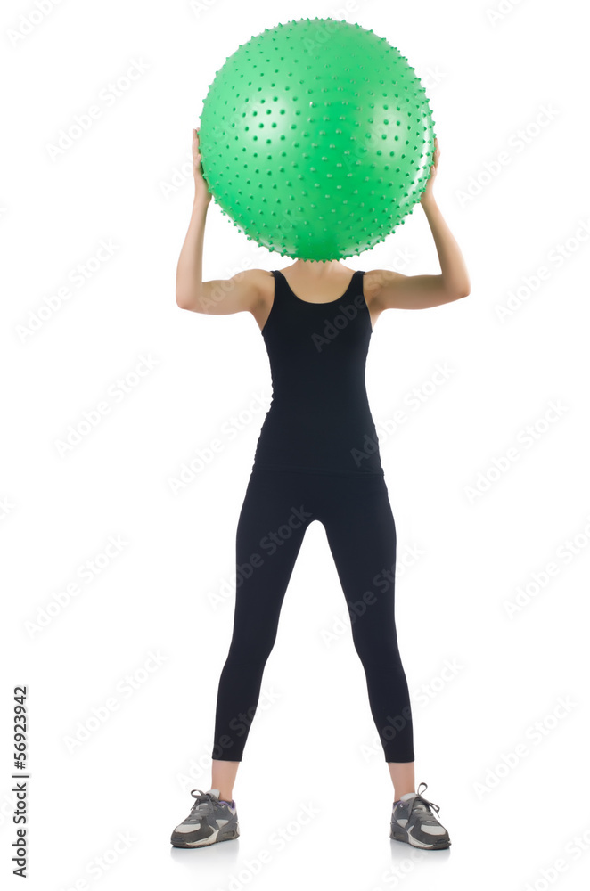 Young woman with ball exercising on whitee Young woman with ball exercising on whitee