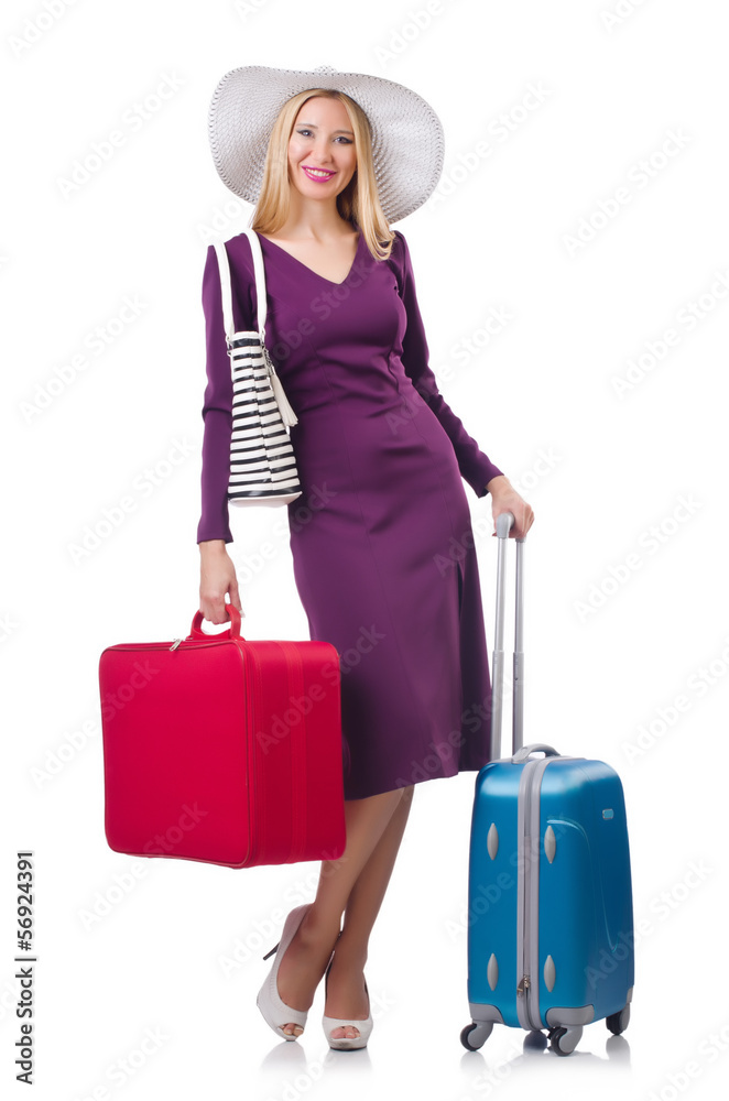 Girl with suitcases isolated on white
