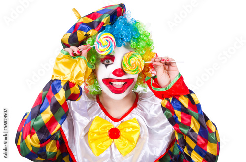 Clown with lollipops isolated on white