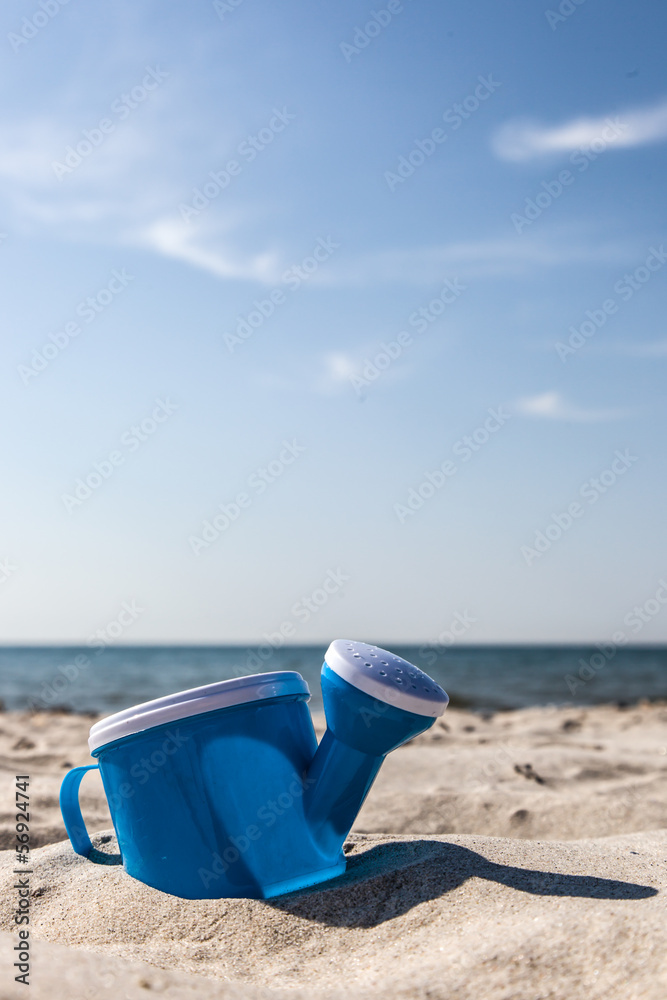 Gießkanne am Strand Gießkanne am Strand