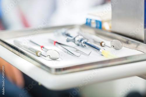 Sterile tools for dentist in practice photo
