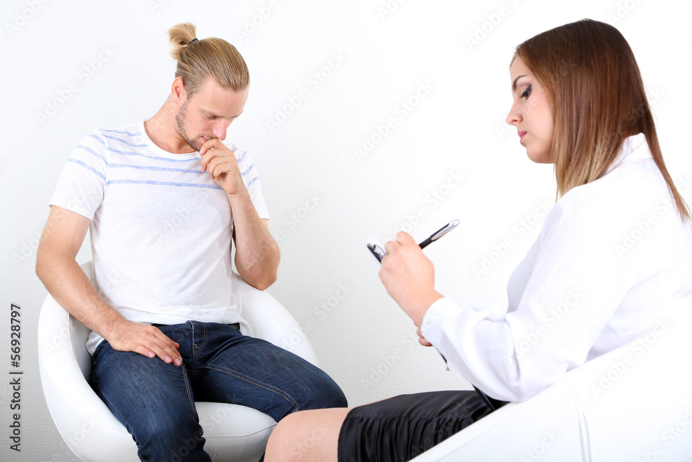 Man with problem on reception for psychologist Man with problem on reception for psychologist