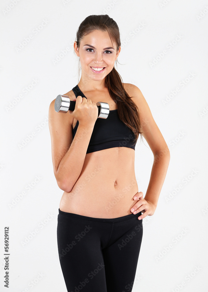 Beautiful young girl doing exercises at home Beautiful young girl doing exercises at home