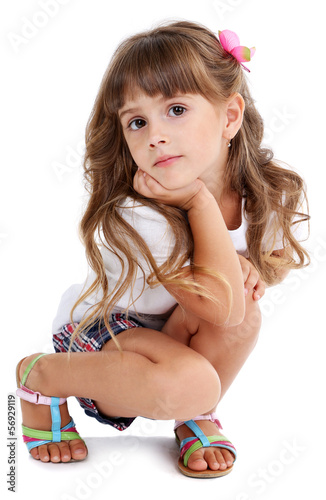 Little girl posing isolated...