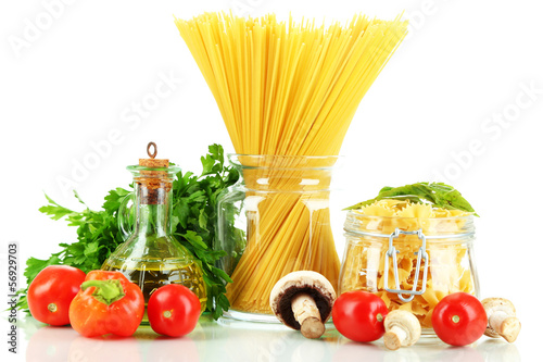 Different types pasta with vegetables isolated on white