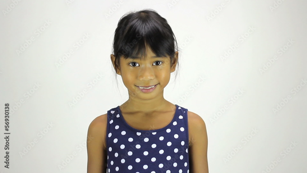 Cute Little Asian Girl Smiling At Camera Cute Little Asian Girl Smiling At Camera