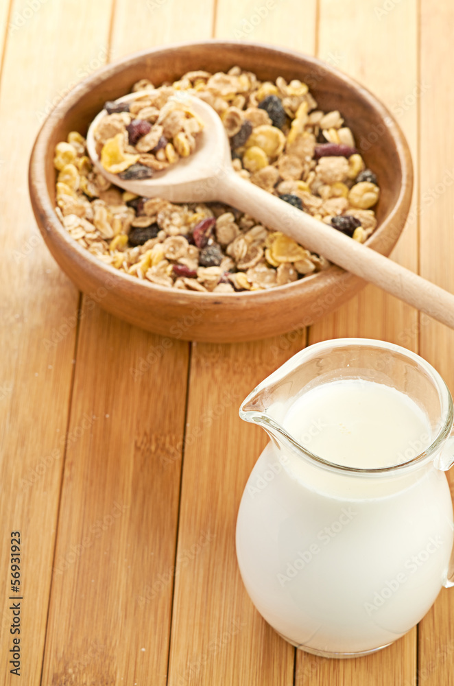 Plate with raw oatmeal on wooden table. Plate with raw oatmeal on wooden table.