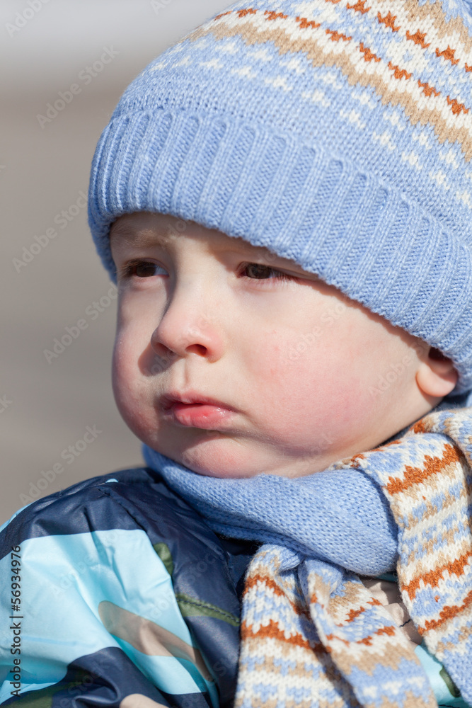 Portrait of the little boy in an autumn jacket and a cap Portrait of the little boy in an autumn jacket and a cap