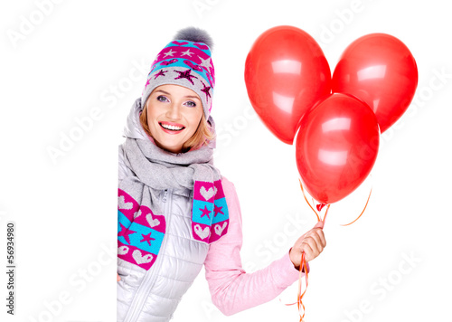 Happy american woman with red balloons and banner