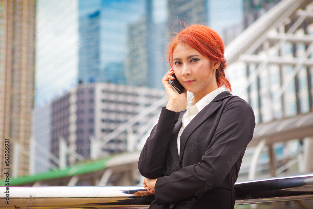Fototapeta premium Woman calling on the phone