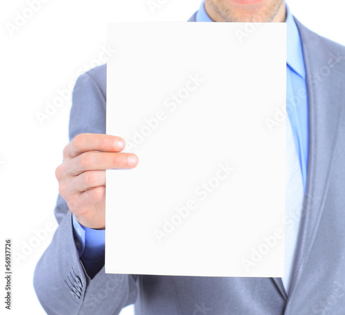 Nice businessman holds white poster.