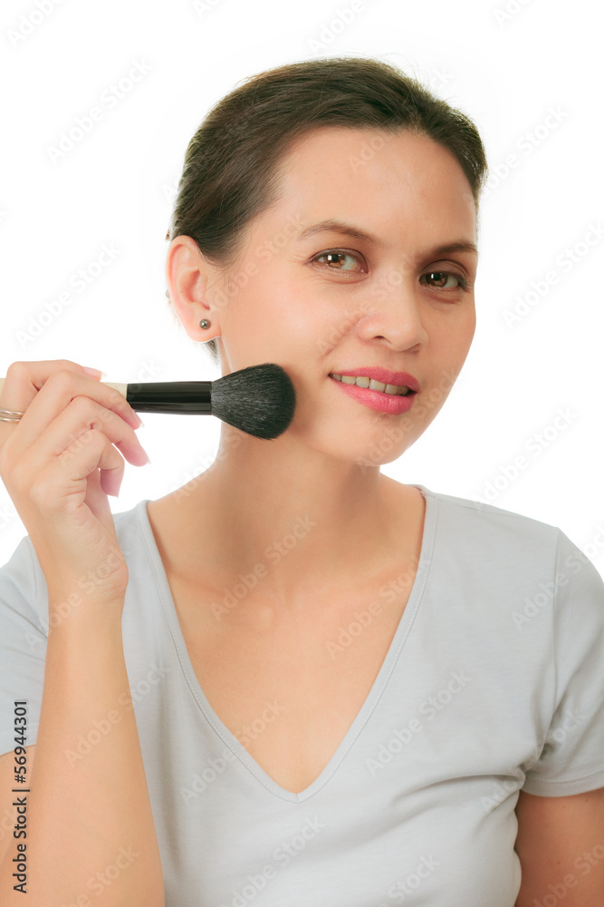 Middle age asian woman with make up brush. Middle age asian woman with make up brush.