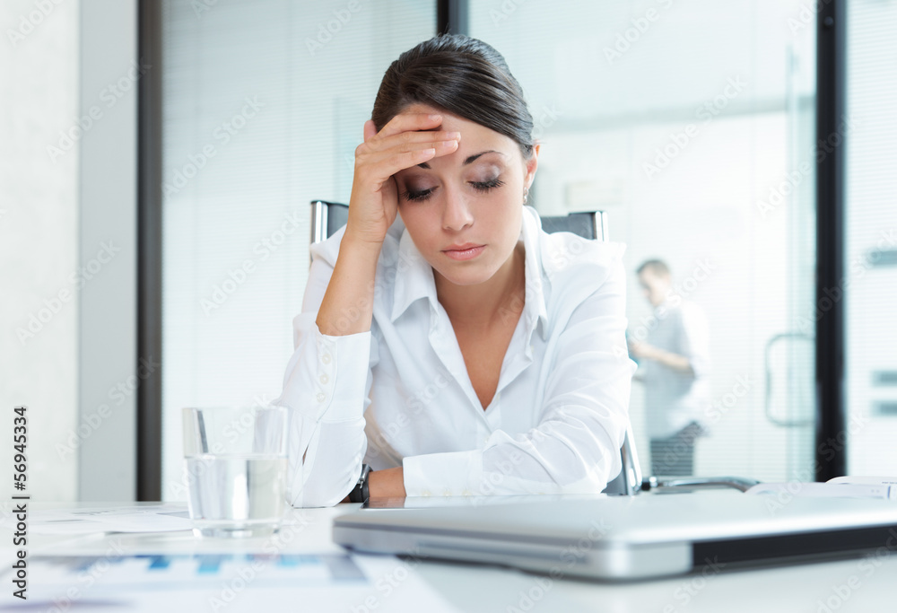 Exhausted businesswoman Exhausted businesswoman