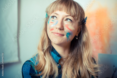 beautiful blonde woman painter