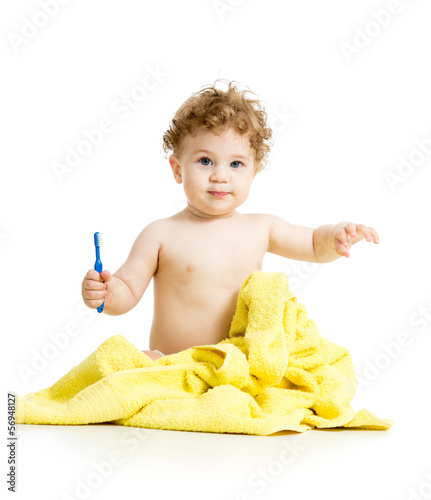 baby boy brushing teeth