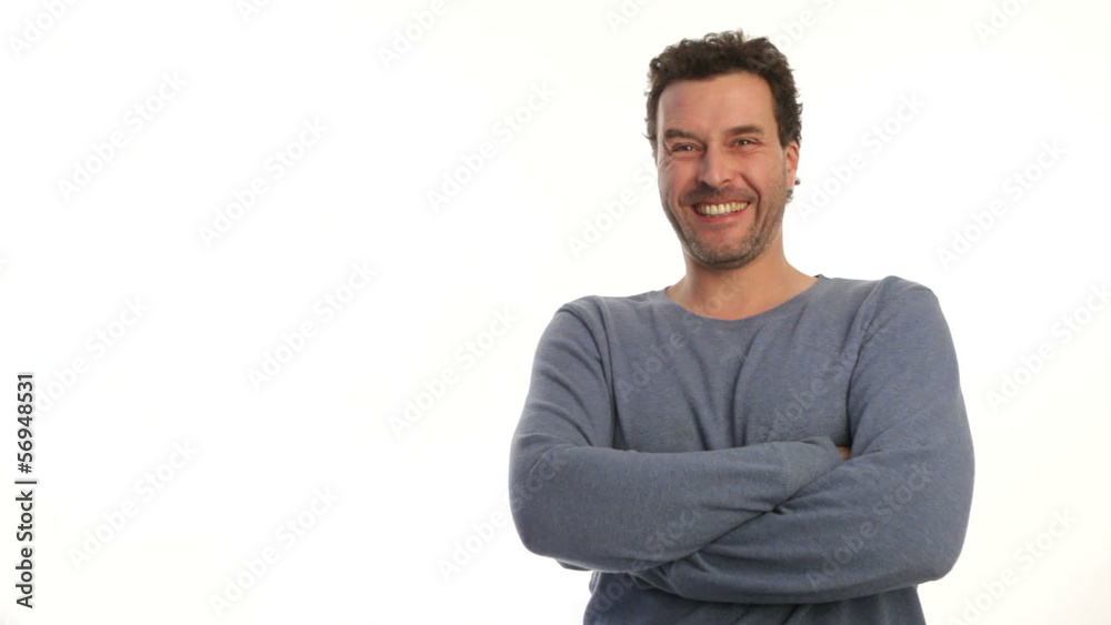 Caucasian Man in casual clothing, happily laughing Caucasian Man in casual clothing, happily laughing