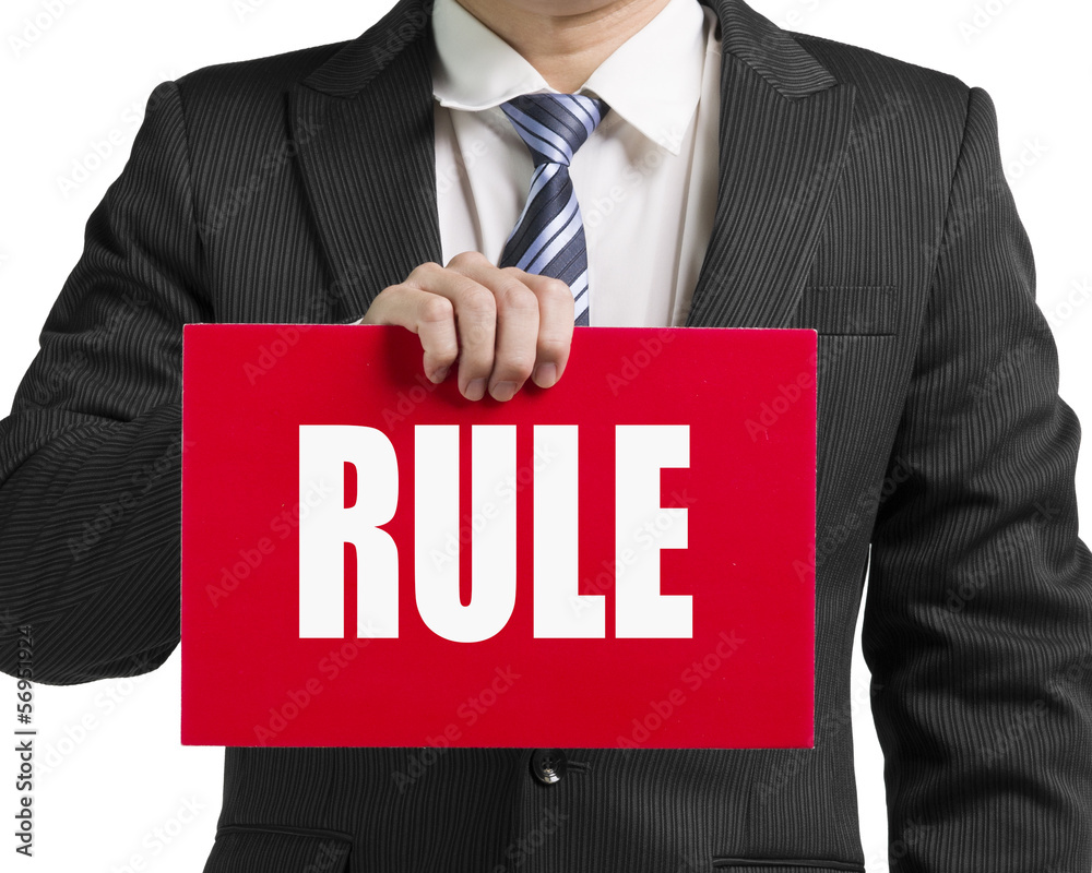 Businessman use one hand to hold a red board with word Businessman use one hand to hold a red board with word