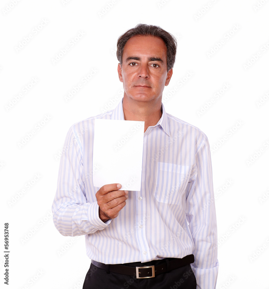 Adult charismatic male holding a white card