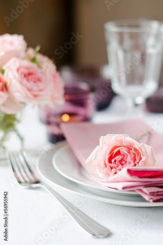Beautiful festive table setting with roses