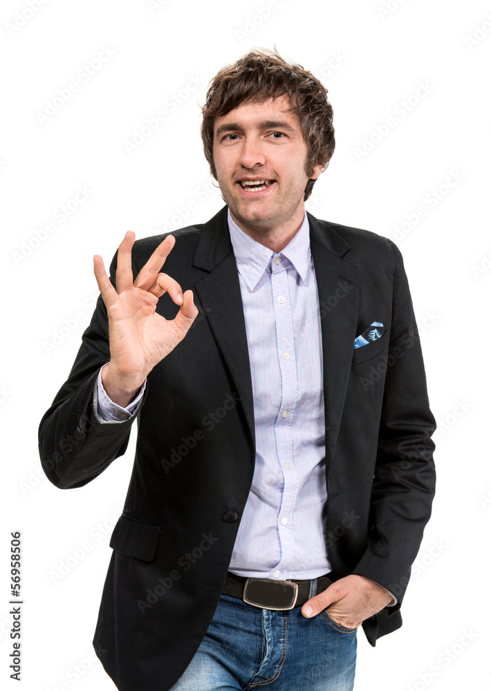 Smiling businessman showing ok sign Smiling businessman showing ok sign