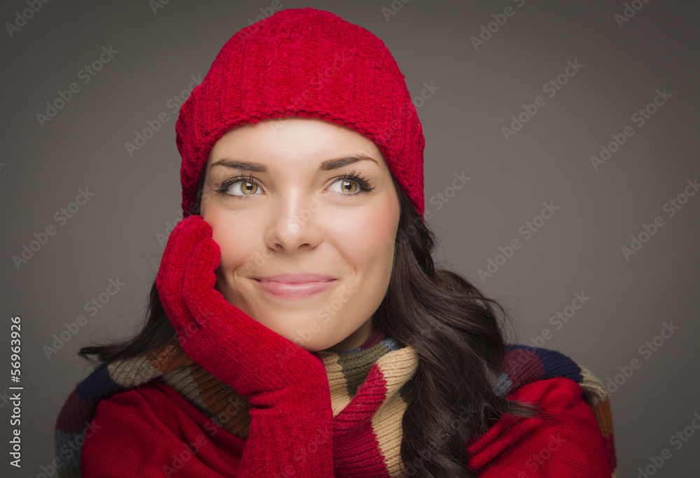 Mixed Race Woman Wearing Mittens Looks to Side Mixed Race Woman Wearing Mittens Looks to Side