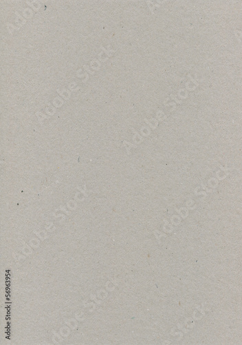 Grey wrapping paper cardboard texture vertical macro closeup