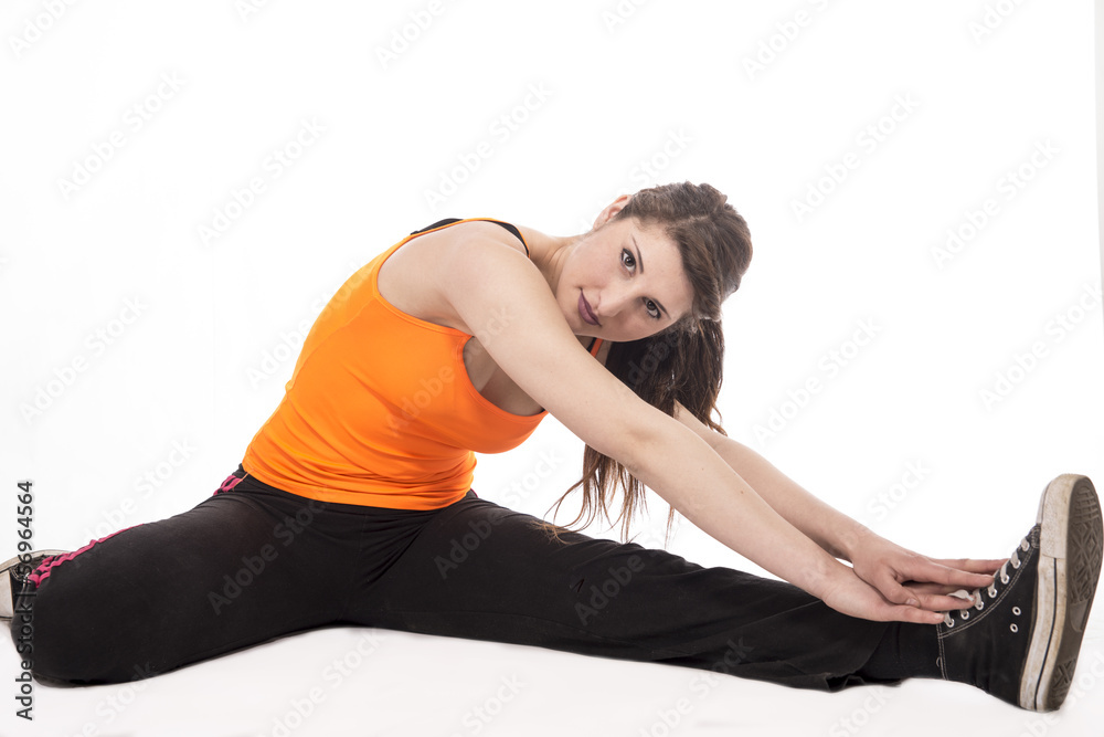 Young lady doing sport exercises, stretching and warming Young lady doing sport exercises, stretching and warming