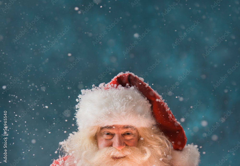 Magical portrait of Santa Claus in snowfall at North Pole Magical portrait of Santa Claus in snowfall at North Pole